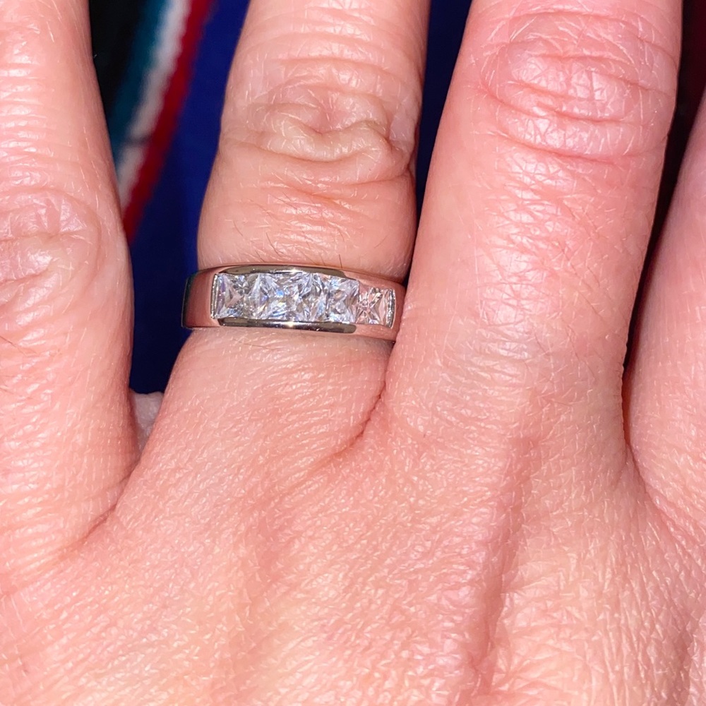 Sterling silver ring with 4 cz square stones
